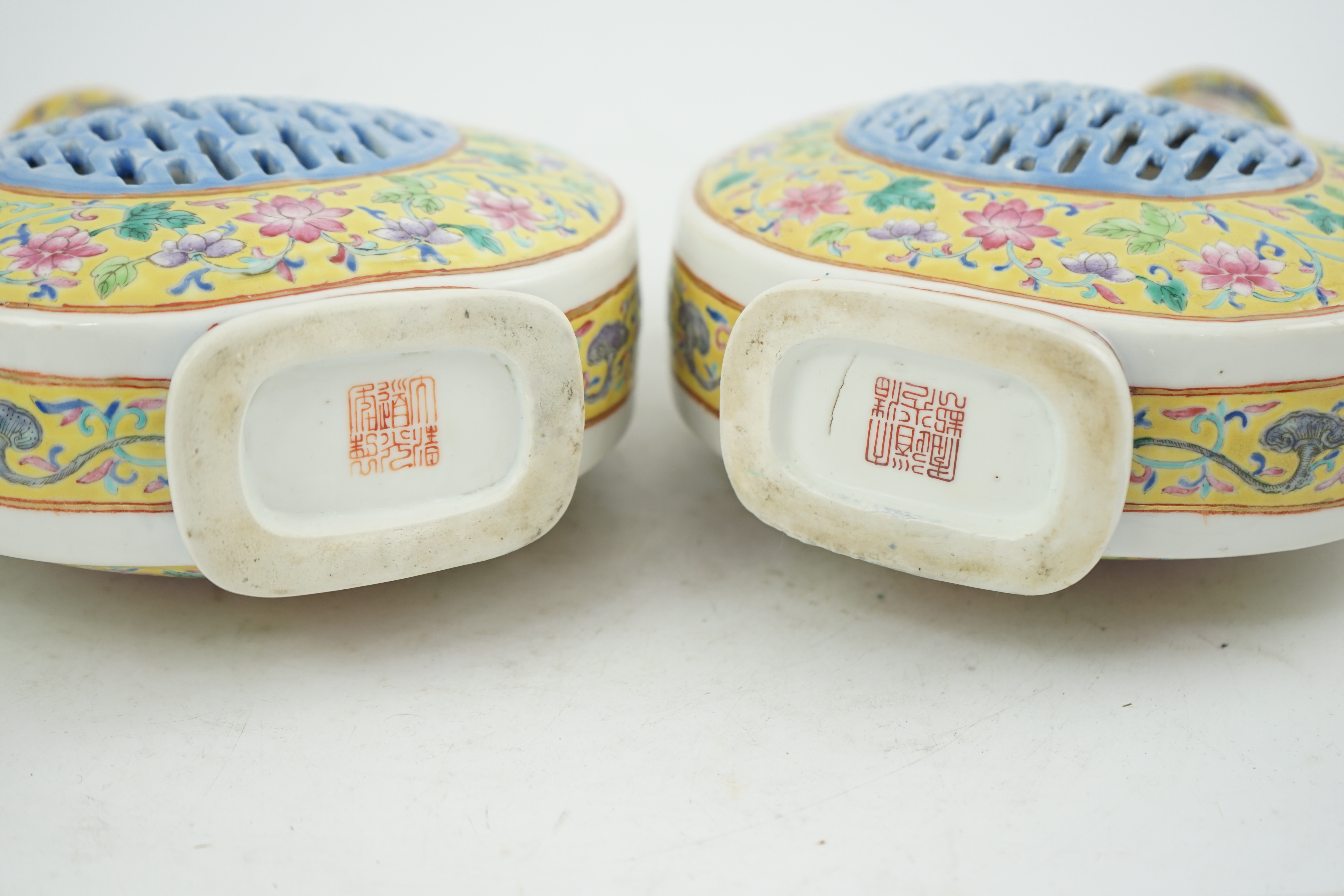 A pair of Chinese yellow ground double-walled moonflasks, bianhu, Daoguang marks, 19th century